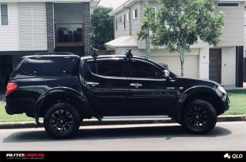 MITSUBISHI TRITON VAPOR BLACK MACHINED WITH DARK TINT
